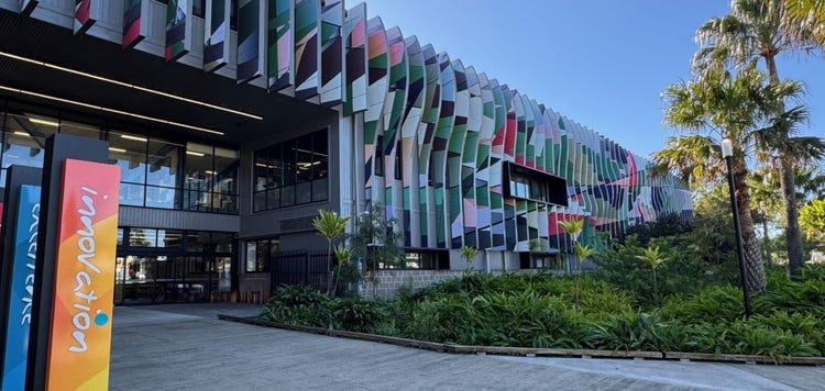 Brightly coloured front fascade of the school entrance